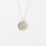Paw print jewellery. The engraved print necklace in silver.