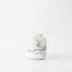 Buddy pet urn. Image of fluted contemporary urn in white.