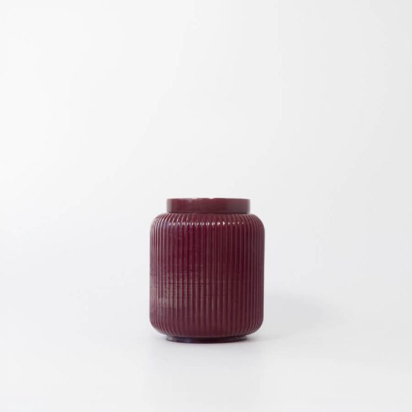 Buddy pet urn. Image of fluted contemporary urn in plum.