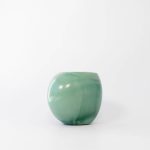 Buddy pet urn. Image of organic marbled urn in sage.