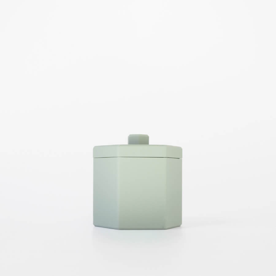 Buddy pet cremation urn. Image of contemporary hex urn in sage.