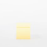 Buddy pet cremation urn. Image of modern cube urn in lemon.