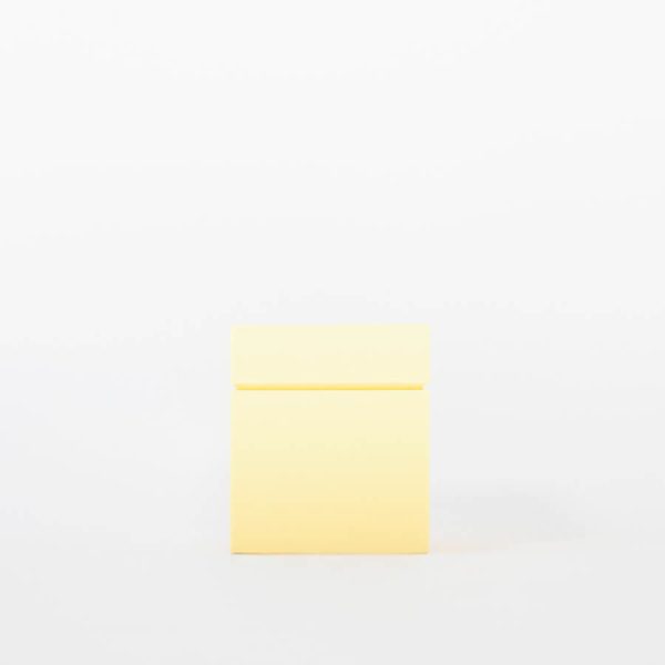 Buddy pet cremation urn. Image of modern cube urn in lemon.