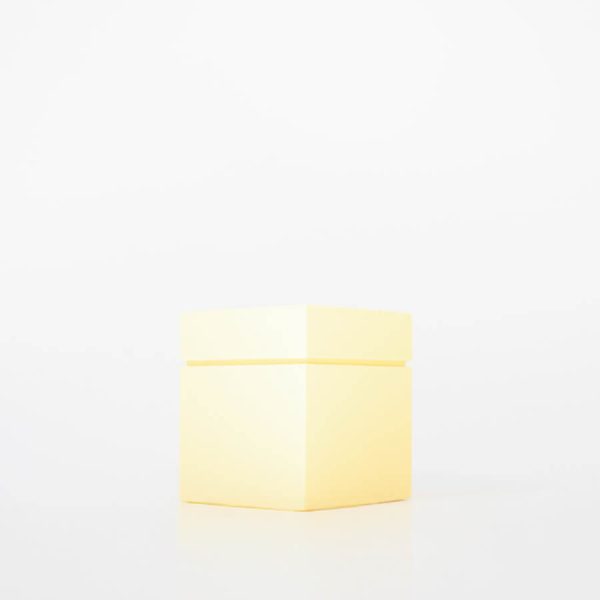 Buddy pet cremation urn. Image of modern cube urn in lemon.