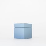 Buddy pet cremation urn. Image of modern cube urn in ocean.