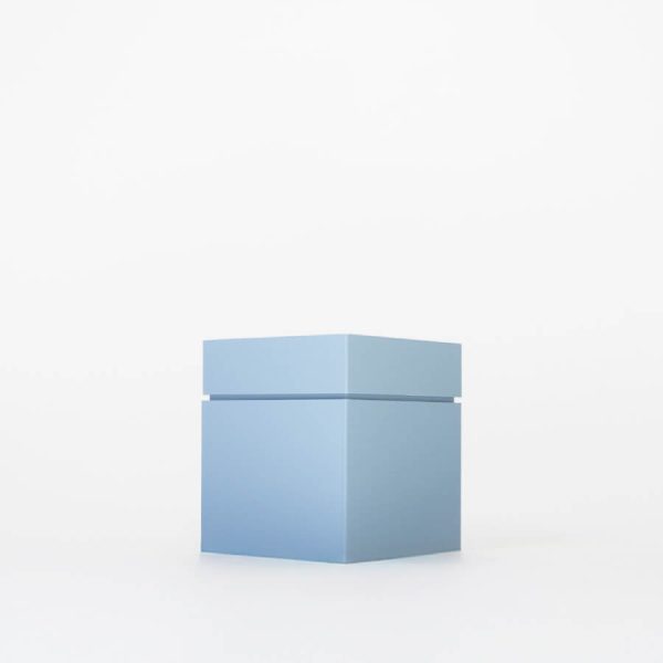 Buddy pet cremation urn. Image of modern cube urn in ocean.